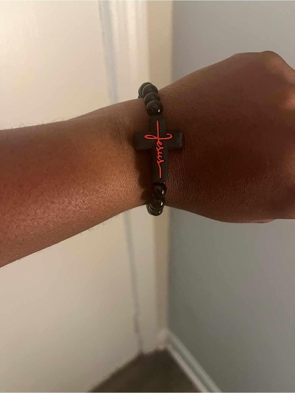 Black Beaded Cross Bracelet with Red Script Accent